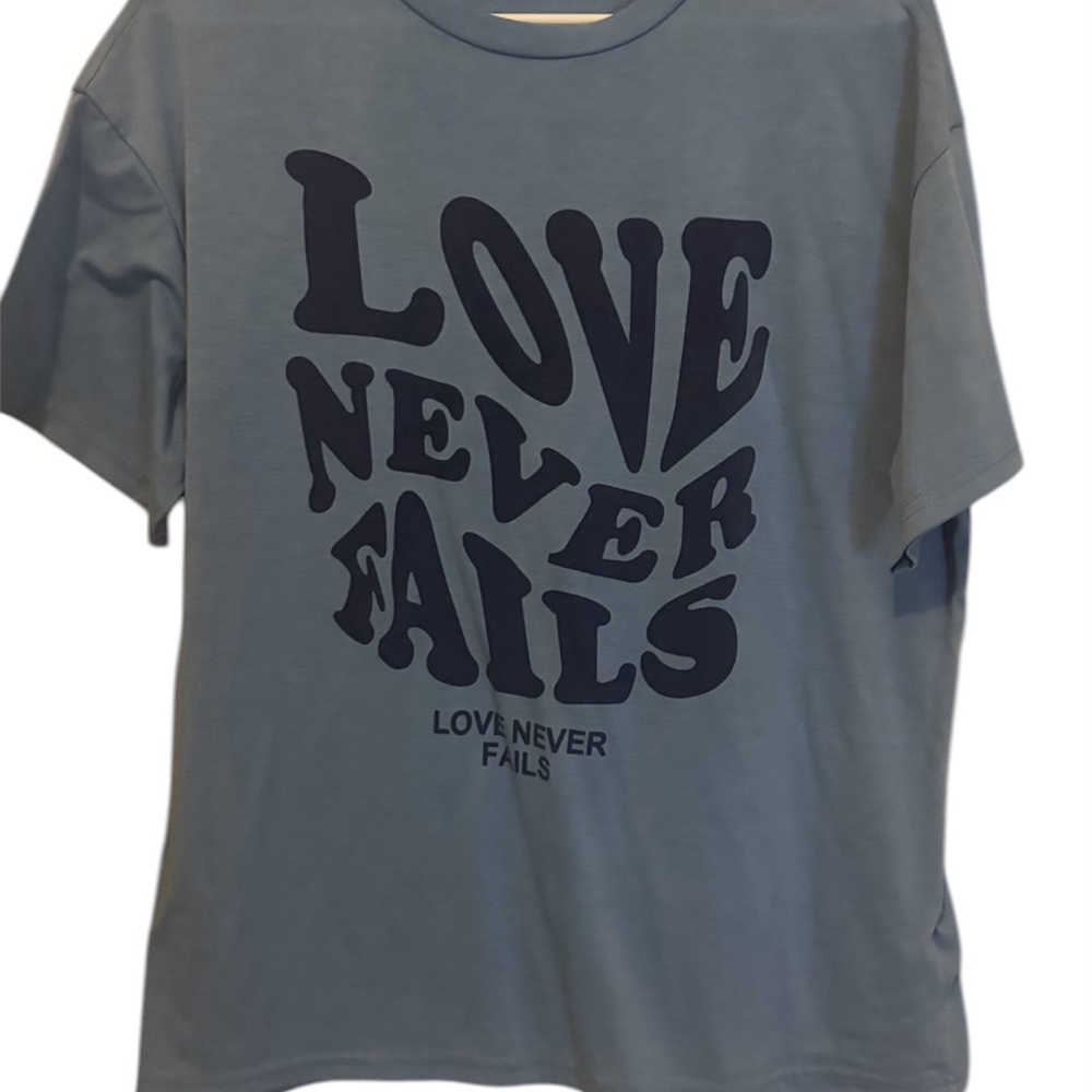 Blue Inspirational Oversized Graphic T-Shirt with Love Never Fails Print
